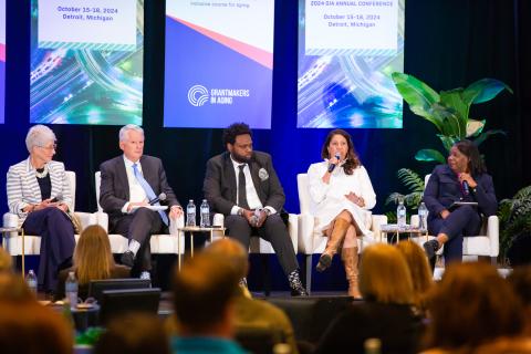 2024 conference plenary speakers speakers at a conference plenary session