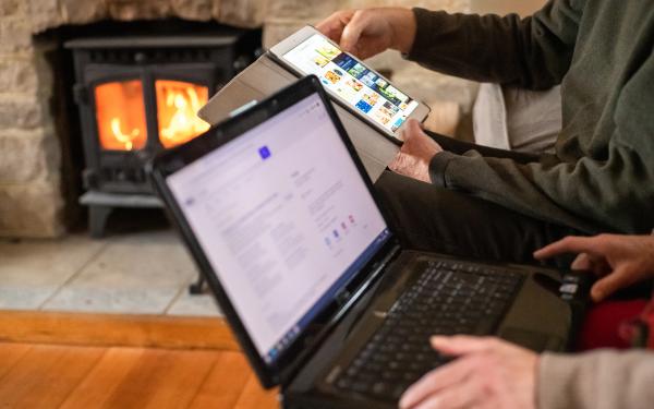 man and woman hands on computers