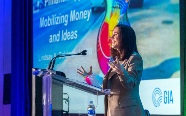 Photo of Lindsay A. Goldman standing at a podium