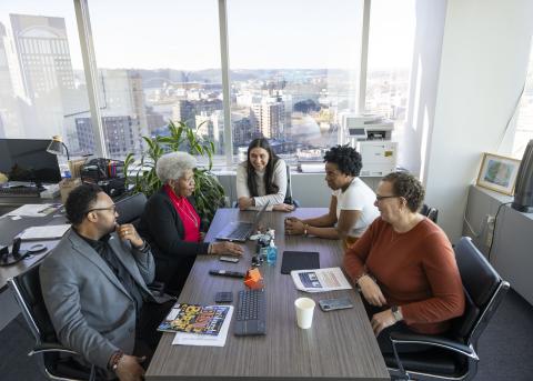 older adults at conference table