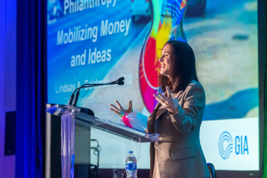 Photo of Lindsay A. Goldman standing at a podium